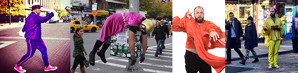 A fair-skinned, bearded man, wearing a shocking-purple suit with a pink stripe on the pant leg, hot pink-and-white high top sneakers, and a white pointy dress hat with a black band, strides dramatically across a red-brick city street, their right arm raised. In the second image, the artist lays face down across the utility box attached to an urban light pole, their arms and legs hanging down. They wear a golden helmet, knee-high black boots, black gloves, and a black t-shirt underneath a fuschia dress with an animal print belt. In the third image the same person seems to be dancing by himself. They fill the whole frame and make a dramatic hand gesture in a billowing loose-fit orange fabric top over black pants. In the final image they stand on a street corner in front of colorful store signs, sporting a chartreuse-colored ensemble, holding an artifact, and gesturing with their right hand, garnering the attention of two passersby.