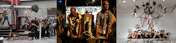 The first of three photos is a complex outdoor image—a band of people in sailor uniforms play saxophones and other instruments to the right of a wooden stage. One person stands on stage near a large silver-foil wrapped sculptural contraption that holds an oversized sculptural head on a balancing beam. The second image, indoors, is a close-up of two performers on stage amid abstract sculpture in front of a rectangular white-lit banner on which can be read part of a phrase, "YO(__?) BOOTS ON." The third image is of a well-lit indoor stage with a large sculpture suspended from above and a band of musicians, their lower bodies hidden from sight, all playing silver horns.