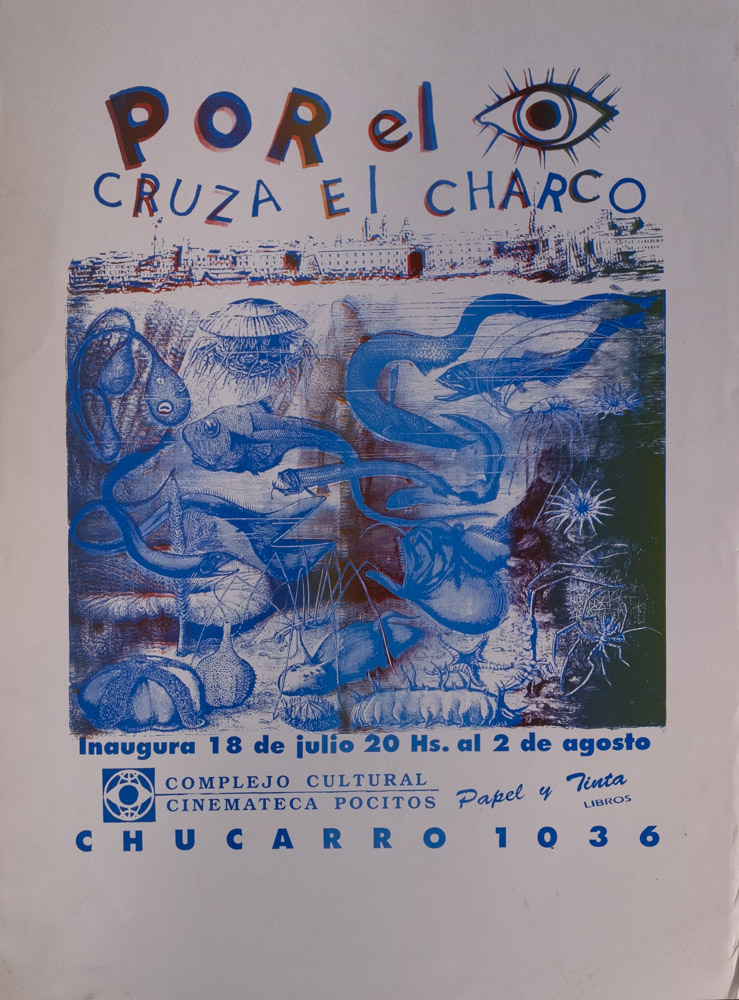 A poster for an event titled "Por el [drawing of an eye] Cruze el charco" Below these words is a blue and dark burgundy/purple image of sea creatures, and beneath this image are dates and logos.