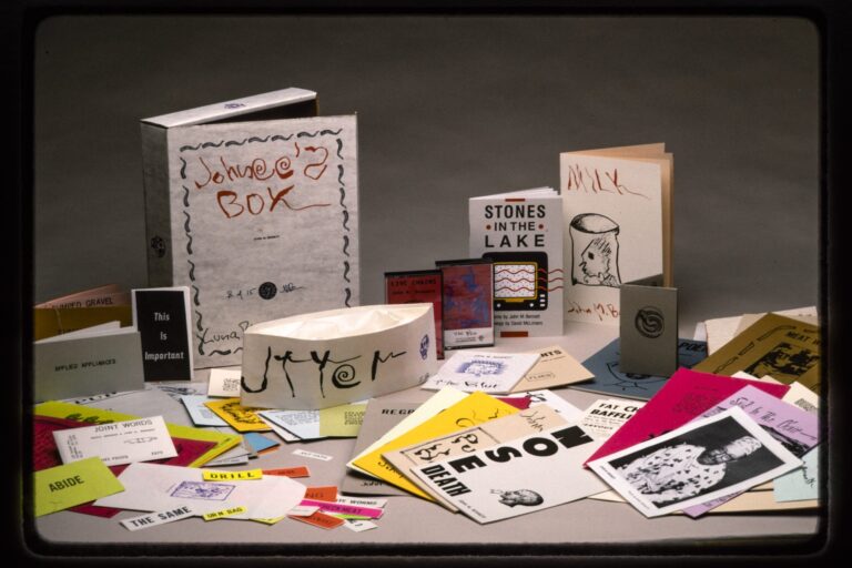 Slide documentation of artists’ books made by John M. Bennett.